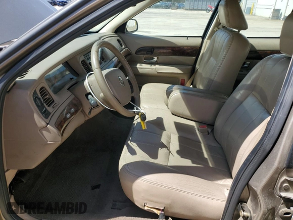 2005 Mercury Grand Marquis LS Premium z VIN 2MEFM75W95X642339, wystawiony jako Copart lot #50391035 z przebiegiem 127 526 mil mil oraz Szkoda całkowita • Salvage title. Historia ofert i sprzedaży dostępna na DreamBid. Obrazek 7.