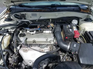 2003 Mitsubishi Galant ES with VIN 4A3AA46G23E194144, listed as a IAAI auction lot 41932939 with 164,844 mi miles. Bid and sale history available at carsss.com. Image 10.