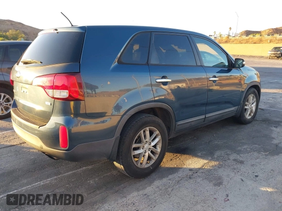 2015 Kia Sorento LX with VIN 5XYKT3A69FG607845, listed as a IAAI auction lot 40806894 with 102,416 mi miles and . Bid and sale history available at DreamBid. Image 4.