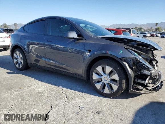 2023 Tesla Model Y Long Range with VIN 7SAYGDEE6PA032862, listed as a Copart auction lot 46542405 with 12,181 mi miles and Salvage Title. Bid and sale history available at DreamBid. Image 4.
