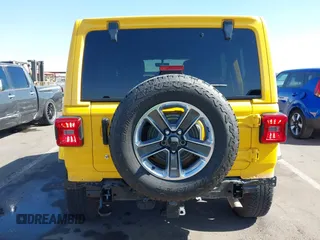 2018 Jeep Wrangler Unlimited Sahara z VIN 1C4HJXEN3JW306282, wystawiony jako IAAI lot #42302821 z przebiegiem 70 204 mil mil oraz . Historia ofert i sprzedaży dostępna na DreamBid. Obrazek 6.