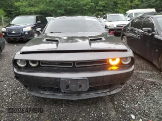 2016 Dodge Challenger SXT z VIN 2C3CDZAG6GH153087, wystawiony jako Copart lot #60778765 z przebiegiem 146 482 mil mil oraz Szkoda całkowita • Salvage title. Historia ofert i sprzedaży dostępna na DreamBid. Obrazek 5.