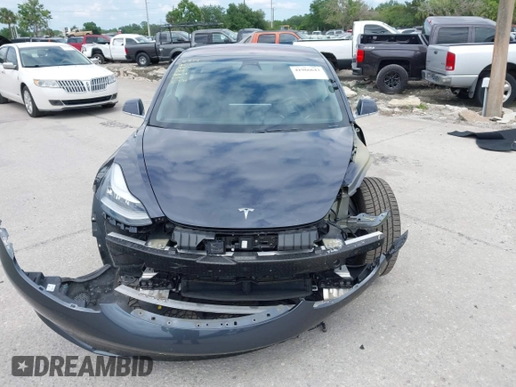 2018 Tesla Model 3 Long Range Battery with VIN 5YJ3E1EB3JF119498, listed as a IAAI auction lot 41966643 with 45,566 mi miles and . Bid and sale history available at DreamBid. Image 13.