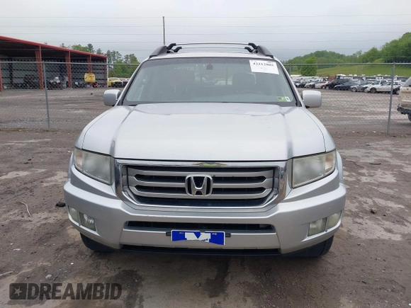 2012 Honda Ridgeline RTL with VIN 5FPYK1F58CB454385, listed as a IAAI auction lot 42212805 with 207,874 mi miles and . Bid and sale history available at DreamBid. Image 12.