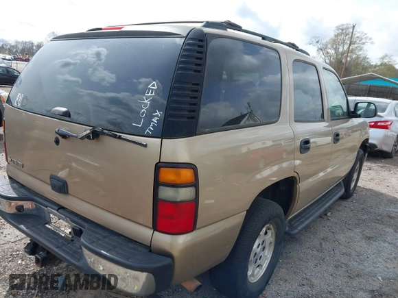 2006 Chevrolet Tahoe LS with VIN 1GNEC13V96J138205, listed as a IAAI auction lot 41746874 with 303,126 mi miles. Bid and sale history available at carsss.com. Image 4.