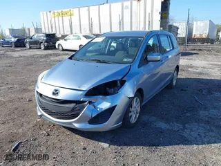 2012 Mazda Mazda5 Sport with VIN JM1CW2BL7C0105928, listed as a IAAI auction lot 42061224 with 59,993 mi miles. Bid and sale history available at carsss.com. Image 6.