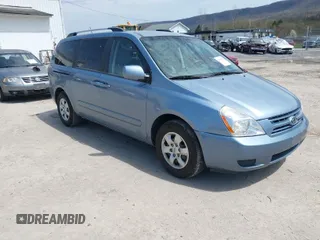 2010 Kia Sedona LX with VIN KNDMG4C37A6329514, listed as a IAAI auction lot 42041079 with 173,423 mi miles. Bid and sale history available at carsss.com. Image 1.