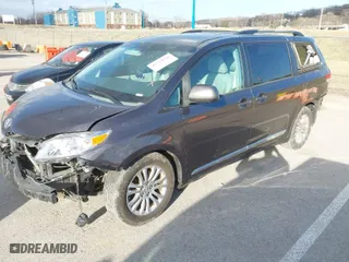 2013 Toyota Sienna XLE AAS with VIN 5TDYK3DC1DS396526, listed as a IAAI auction lot 41734256 with 218,723 mi miles. Bid and sale history available at carsss.com. Image 2.