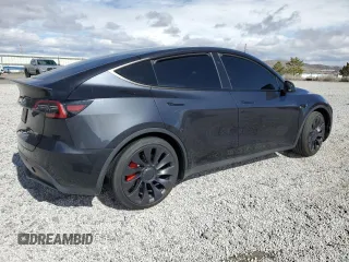 2024 Tesla Model Y Performance z VIN 7SAYGDEF6RF166365, wystawiony jako Copart lot #48885585 z przebiegiem Nie podano mil oraz Szkoda całkowita • Salvage title. Historia ofert i sprzedaży dostępna na DreamBid. Obrazek 3.