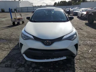 2020 Toyota C-HR LE with VIN JTNKHMBX7L1077252, listed as a Copart auction lot 51486305 with 64,213 mi miles and Salvage Title. Bid and sale history available at DreamBid. Image 5.