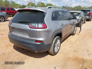 2019 Jeep Cherokee Latitude with VIN 1C4PJLCX7KD220799, listed as a IAAI auction lot 41970875 with 104,394 mi miles and . Bid and sale history available at DreamBid. Image 4.