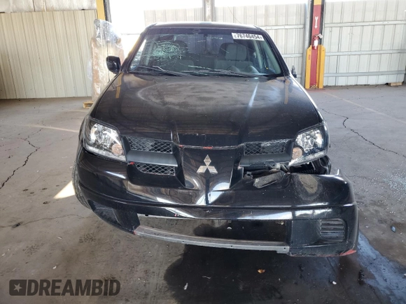 2003 Mitsubishi Outlander LS with VIN JA4LX31G43U021849, listed as a Copart auction lot 76746454 with 136,939 mi miles and Salvage Title. Bid and sale history available at carsss.com. Image 5.