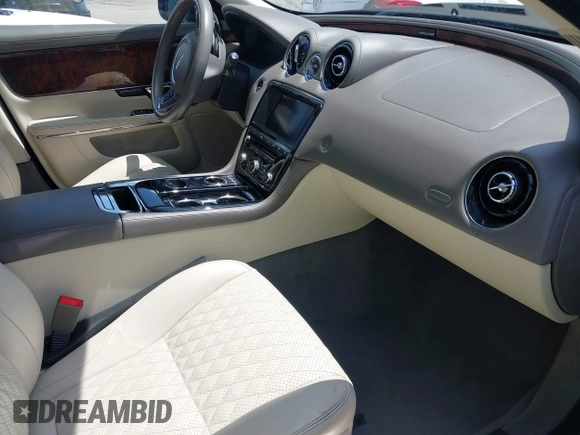 2016 Jaguar XJ Portfolio with VIN SAJWA2G73G8V92934, listed as a IAAI auction lot 42557171 with 106,413 mi miles and . Bid and sale history available at DreamBid. Image 5.