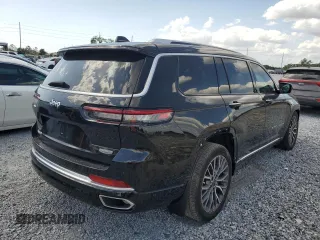 2023 Jeep Grand Cherokee Summit Reserve with VIN 1C4RJKEG5P8853916, listed as a Copart auction lot 52691735 with 18,899 mi miles and Salvage title. Bid and sale history available at DreamBid. Image 3.