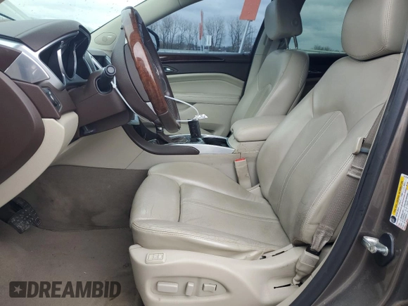 2011 Cadillac SRX Luxury Collection with VIN 3GYFNDEY5BS582930, listed as a Copart auction lot 50057075 with 142,833 mi miles and Salvage Title. Bid and sale history available at carsss.com. Image 7.
