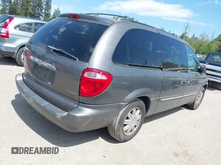 2004 Chrysler Town & Country Touring with VIN 2C4GP54L04R534395, listed as a IAAI auction lot 42182506 with 195,611 mi miles and . Bid and sale history available at DreamBid. Image 4.