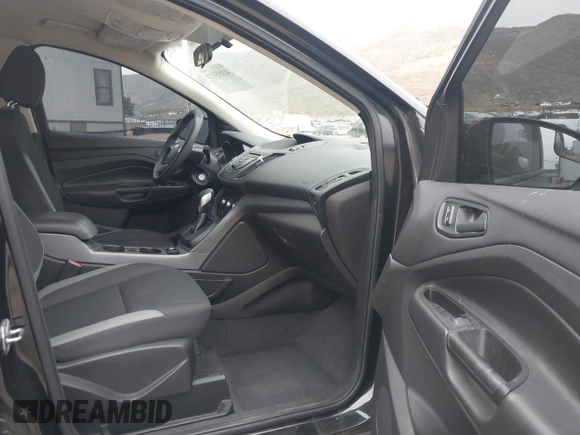 2015 Ford Escape S with VIN 1FMCU0F71FUC05149, listed as a IAAI auction lot 42055622 with 156,738 mi miles and . Bid and sale history available at DreamBid. Image 5.