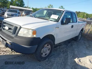 2007 Ford F-150 XLT with VIN 1FTPX14V47FA43043, listed as a IAAI auction lot 42050633 with 137,097 mi miles. Bid and sale history available at carsss.com. Image 2.
