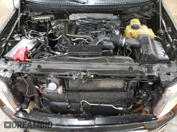 2014 Ford F-150 XL с VIN 1FTFW1EF2EFA60846, выставлен на аукционе Copart как лот 58653295 с пробегом 210 437 миль миль и Чистый • Clean title. История ставок и продаж доступна на DreamBid. Изображение 11.