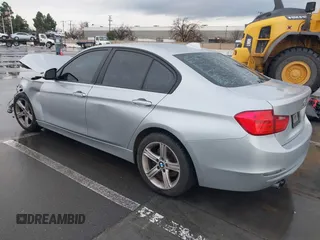 2013 BMW 3 Series 328i with VIN WBA3C1G59DNN93746, listed as a IAAI auction lot 41527720 with 215,442 mi miles and . Bid and sale history available at DreamBid. Image 3.