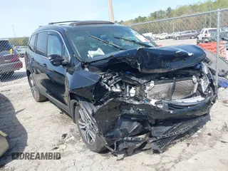 2017 Honda Pilot EX-L with VIN 5FNYF6H52HB056863, listed as a IAAI auction lot 41894368 with Not provided miles and . Bid and sale history available at DreamBid. Image 1.