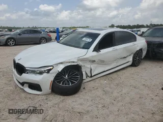 2019 BMW 7 Series 750i z VIN WBA7F0C52KGM24906, wystawiony jako Copart lot #53934735 z przebiegiem 96 247 mil mil oraz Szkoda całkowita • Salvage title. Historia ofert i sprzedaży dostępna na DreamBid. Obrazek 1.