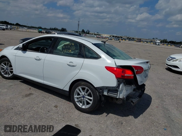 2018 Ford Focus SE with VIN 1FADP3F29JL213008, listed as a IAAI auction lot 41790224 with 85,056 mi miles and . Bid and sale history available at DreamBid. Image 3.