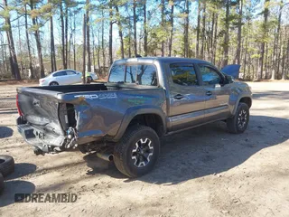 2016 Toyota Tacoma SR with VIN 5TFCZ5AN5GX045267, listed as a IAAI auction lot 41151555 with 162,882 mi miles. Bid and sale history available at carsss.com. Image 4.