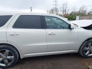 2012 Dodge Durango R/T with VIN 1C4SDJCT1CC195893, listed as a IAAI auction lot 41968863 with 201,388 mi miles and . Bid and sale history available at DreamBid. Image 13.