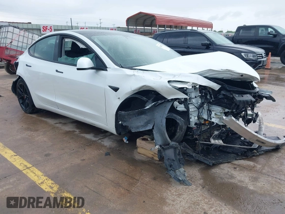 2023 Tesla Model 3 Performance z VIN 5YJ3E1EC8PF487550, wystawiony jako IAAI lot #42093712 z przebiegiem 27 305 mil mil oraz . Historia ofert i sprzedaży dostępna na DreamBid. Obrazek 1.
