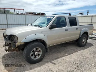 2003 Nissan Frontier XE with VIN 1N6ED27T63C465758, listed as a Copart auction lot 57671545 with 111,672 mi miles and Salvage title. Bid and sale history available at DreamBid. Image 1.