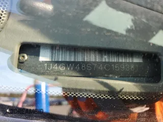2004 Jeep Grand Cherokee Laredo z VIN 1J4GW48S74C159381, wystawiony jako Copart lot #53972115 z przebiegiem 128 309 mil mil oraz Szkoda całkowita • Salvage title. Historia ofert i sprzedaży dostępna na DreamBid. Obrazek 13.