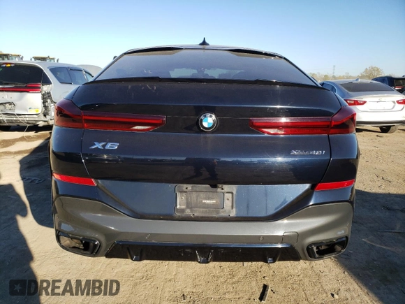 2020 BMW X6 xDrive40i z VIN 5UXCY6C03L9D00816, wystawiony jako Copart lot #76538674 z przebiegiem Nie podano mil oraz Szkoda całkowita • Salvage title. Historia ofert i sprzedaży dostępna na DreamBid. Obrazek 6.