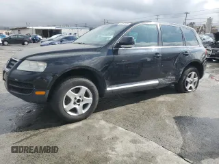2005 Volkswagen Touareg z VIN WVGZG77LX5D063808, wystawiony jako Copart lot #44457935 z przebiegiem 172 252 mil mil oraz Czysty tytuł • Clean title. Historia ofert i sprzedaży dostępna na DreamBid. Obrazek 1.