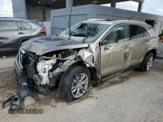 2022 Cadillac XT5 FWD Premium Luxury z VIN 1GYKNCRS4NZ179429, wystawiony jako Copart lot #47180195 z przebiegiem 45 649 mil mil oraz Nie do naprawy • Non repairable. Historia ofert i sprzedaży dostępna na DreamBid. Obrazek 1.