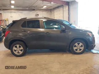 2016 Chevrolet Trax LT z VIN 3GNCJLSB8GL260323, wystawiony jako IAAI lot #42225908 z przebiegiem 134 265 mil mil oraz . Historia ofert i sprzedaży dostępna na DreamBid. Obrazek 13.