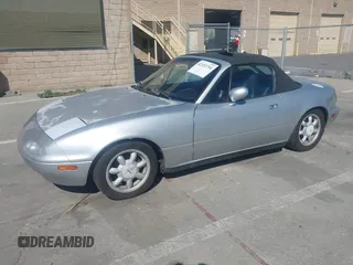 1991 Mazda MX-5 Miata Special Edition z VIN JM1NA3511M1235948, wystawiony jako IAAI lot #42322754 z przebiegiem 151 065 mil mil oraz . Historia ofert i sprzedaży dostępna na DreamBid. Obrazek 18.