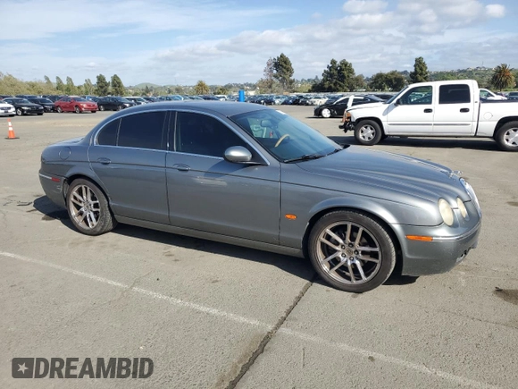 2005 Jaguar S-Type with VIN SAJWA01T15FN13800, listed as a Copart auction lot 53576305 with 182,533 mi miles and Salvage Title. Bid and sale history available at DreamBid. Image 4.