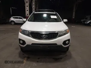 2011 Kia Sorento EX with VIN 5XYKUDA2XBG136475, listed as a IAAI auction lot 41795452 with 218,041 mi miles. Bid and sale history available at carsss.com. Image 6.