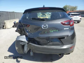 2017 Mazda CX-3 Touring z VIN JM1DKDC73H0172403, wystawiony jako Copart lot #47396355 z przebiegiem 79 865 mil mil oraz Szkoda całkowita • Salvage title. Historia ofert i sprzedaży dostępna na DreamBid. Obrazek 6.