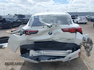 2025 BMW X2 xDrive28i with VIN WBX63GM06S5066386, listed as a IAAI auction lot 41812615 with 1,598 mi miles. Bid and sale history available at carsss.com. Image 16.
