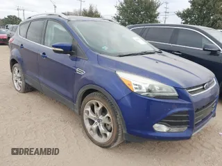 2016 Ford Escape Titanium with VIN 1FMCU0J97GUB96726, listed as a IAAI auction lot 41322229 with 119,237 mi miles. Bid and sale history available at carsss.com. Image 1.