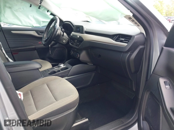 2021 Ford Escape S with VIN 1FMCU0F63MUA50558, listed as a IAAI auction lot 42072684 with 19,241 mi miles and . Bid and sale history available at DreamBid. Image 5.