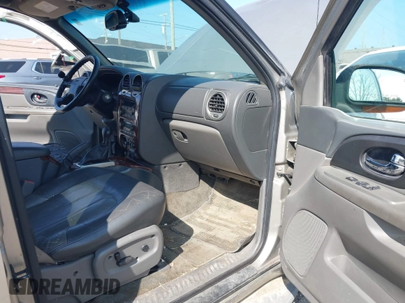 2003 GMC Envoy SLT with VIN 1GKES16S336101568, listed as a IAAI auction lot 40187998 with 185,402 mi miles. Bid and sale history available at carsss.com. Image 5.