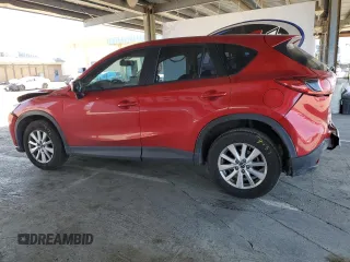 2016 Mazda CX-5 Sport with VIN JM3KE2BY8G0837203, listed as a Copart auction lot 54960845 with 116,656 mi miles and Salvage title. Bid and sale history available at DreamBid. Image 2.