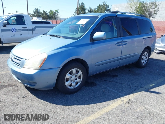 2009 Kia Sedona LX with VIN KNDMB233396300879, listed as a IAAI auction lot 41753122 with 183,754 mi miles. Bid and sale history available at carsss.com. Image 2.