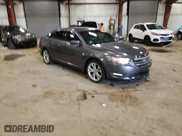 2013 Ford Taurus SEL z VIN 1FAHP2H83DG223446, wystawiony jako Copart lot #53783815 z przebiegiem 122 867 mil mil oraz Czysty tytuł • Clean title. Historia ofert i sprzedaży dostępna na DreamBid. Obrazek 13.