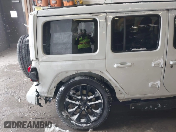 2022 Jeep Wrangler Unlimited Sahara with VIN 1C4HJXEN3NW222744, listed as a IAAI auction lot 41249285 with 43,780 mi miles and . Bid and sale history available at DreamBid. Image 21.