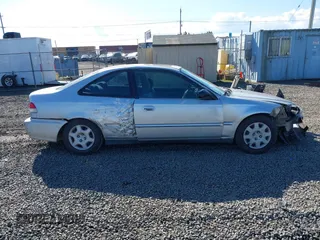 1999 Honda Civic EX with VIN 1HGEJ8242XL025414, listed as a IAAI auction lot 41736378 with 206,342 mi miles. Bid and sale history available at carsss.com. Image 13.