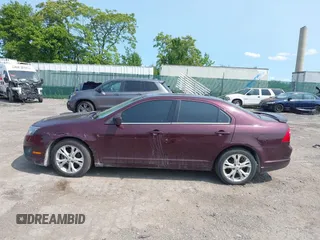 2012 Ford Fusion SE z VIN 3FAHP0HA6CR426765, wystawiony jako IAAI lot #42388306 z przebiegiem 120 016 mil mil oraz . Historia ofert i sprzedaży dostępna na DreamBid. Obrazek 14.